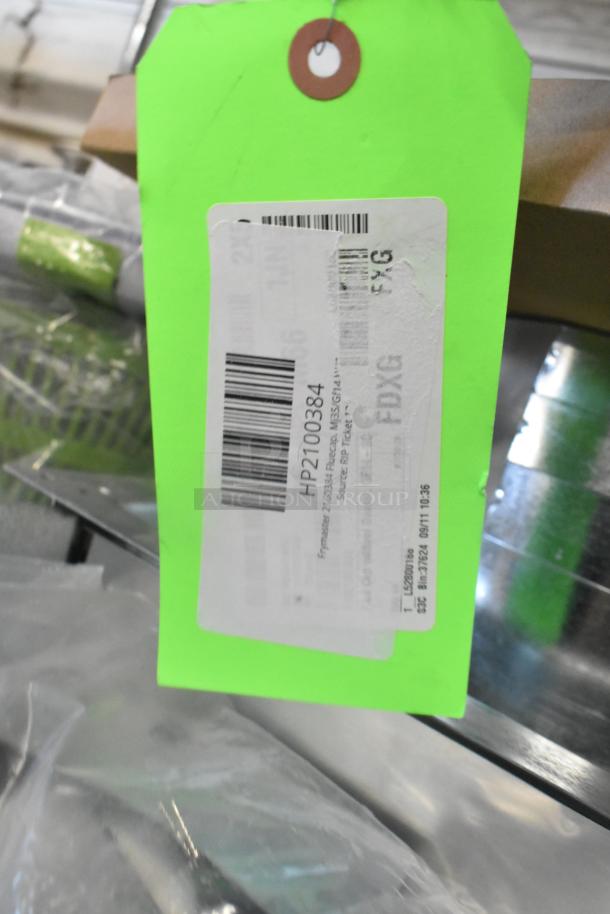 BRAND NEW Frymaster 2100384 Fluecap with tag, suitable for Mj35/Gf14, marked HP2100384. Minor dents noted.