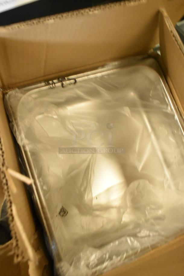 Brand new stainless steel steam table pan, 4" deep, 2/3 size, in box with protective packaging. Scratch and dent condition.