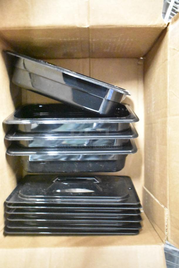 Box containing new scratch and dent black poly drop-in bins with lids, and Choice 2/3 size, 4" deep stainless steel pans.
