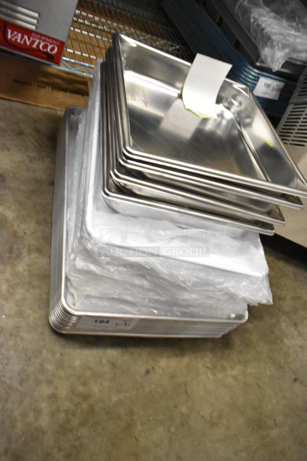 31 brand new Vollrath 30122 Super Pan V® steam table pans, 2/3 size, 2 1/2" deep, anti-jam, 22 gauge stainless steel.