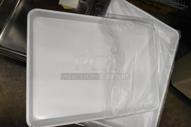 Brand new Vollrath 30122 Super Pan V®, 2/3 size, 2.5" deep, anti-jam stainless steel steam table pans, 22 gauge, wrapped in plastic.