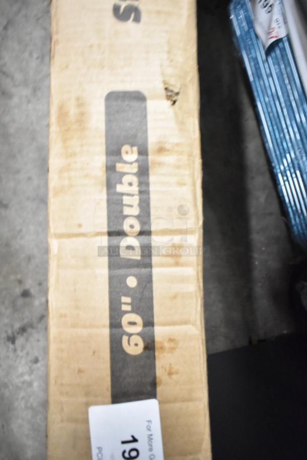 Brand new ServIt 423SW60TLHDBLA 60" lighted strip warmer, scratch and dent condition. Dual toggle controls, 120V. Box shows "60" Double."