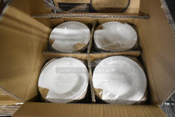 Box of new Acopa and Oneida dinnerware, including 11 oz. rocks glasses, a bowl, and stoneware platters, each wrapped.