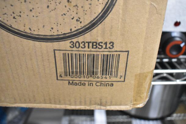 Cardboard box with a barcode and model number 303TBS13 printed, labeled "Made in China." Contains Acopa stoneware platter.