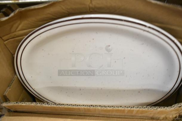 Acopa 11 1/2" x 9 1/8" Brown Speckle Narrow Rim Oval Stoneware Platter, new in box, visible light brown speckles.
