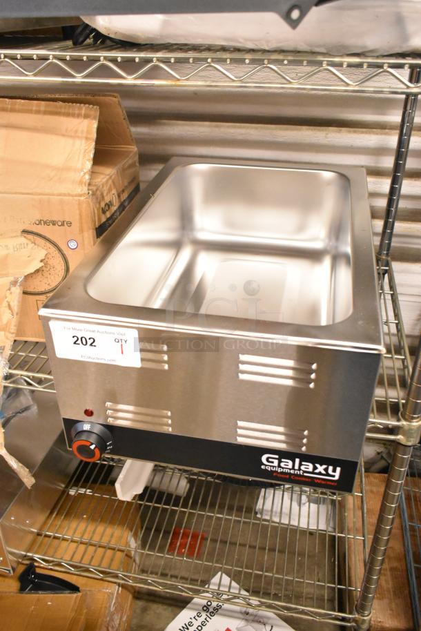 Brand new Galaxy 177GWC50E 12"x20" electric countertop food warmer, 120V, with minor scratches. Model label visible.