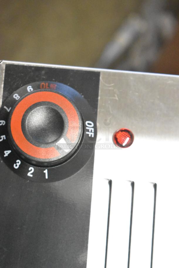 Brand new 2025 Galaxy 177GWC50E electric food warmer, 12"x20", 120V, scratch and dent, showing control knob and indicator light.