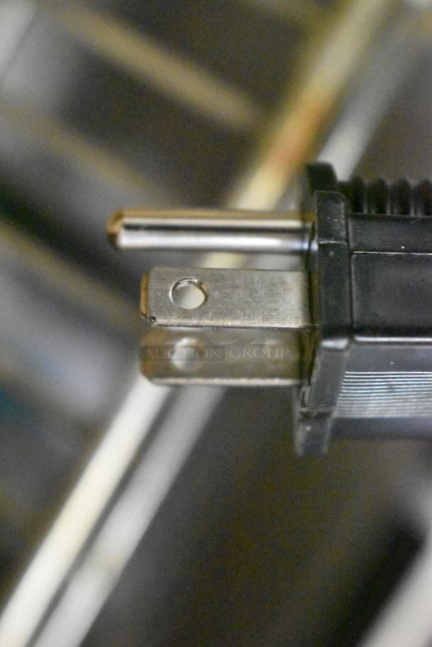 Close-up of a power plug for the 2025 Galaxy 177GWC50E 12" x 20" electric countertop food warmer. New condition.