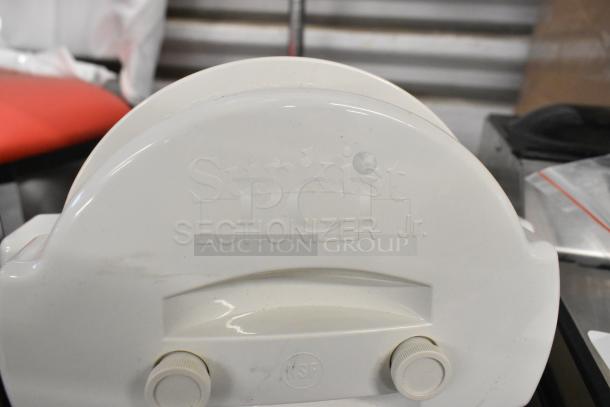 Brand new Sunkist Sectionizer Jr. with NSF marking, minor blemishes. Includes Galaxy model 177GWC50E Black Round Bin.