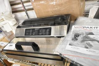 BRAND NEW VacPak-It 186VME12SS Vacuum Packaging Machine, stainless steel, 12" seal bar, visible control panel, 120V, scratch and dent.