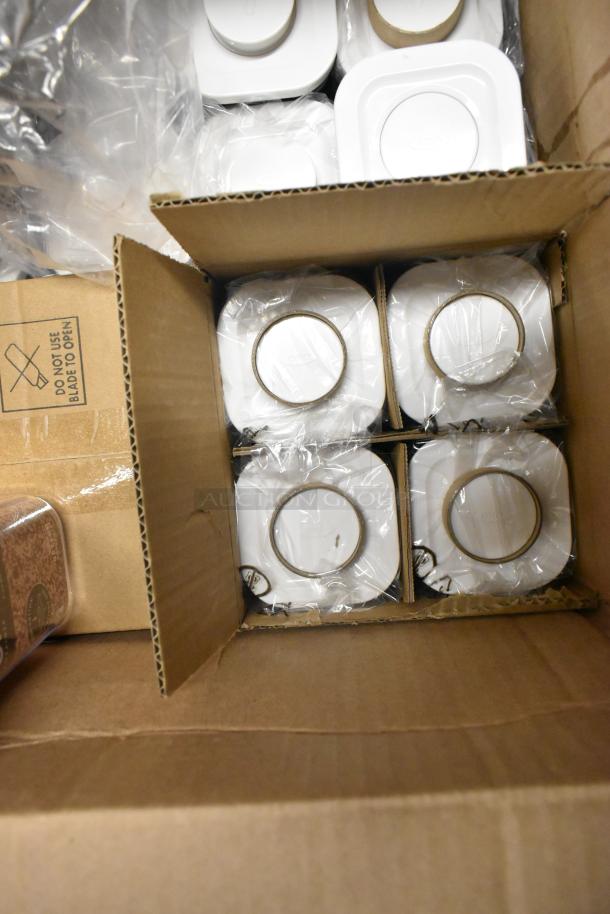 Box of new OXO Good Grips 0.5 Qt. clear square SAN plastic food storage containers with white POP lids, scratch and dent.