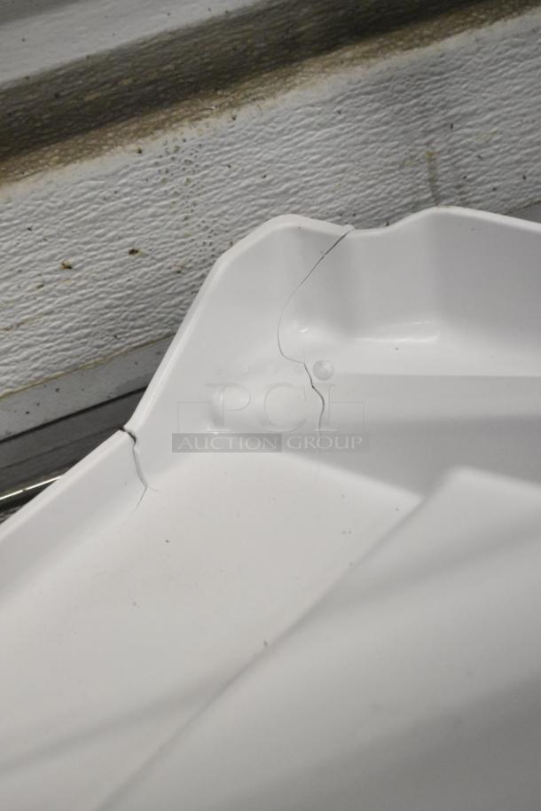 Manitowoc Ice 4010989 water curtain with visible scratch and dent, new condition despite marks, ice machine part.