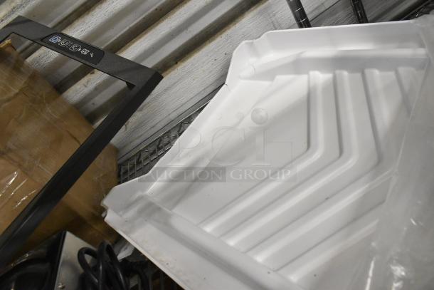 Brand new Manitowoc Ice 4010989 water curtain and ice machine part; slight scratch and dent, essential components.