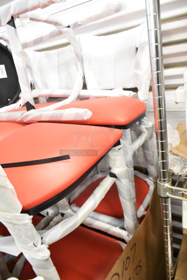 13 new black bar height chairs with red cushions, scratch and dent condition, wrapped for protection.