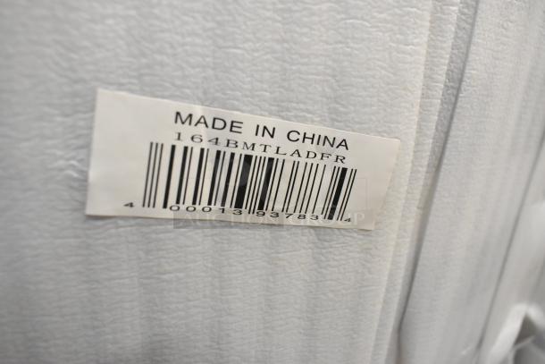 Label showing "Made in China," model 164BMTLADFR, for Lancaster Table & Seating bar chair.