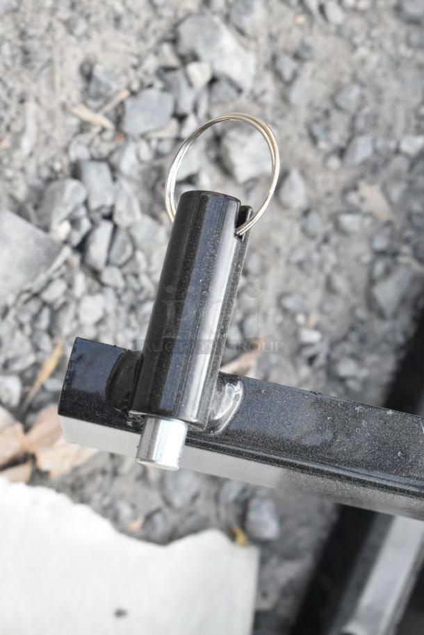 8 brand new scratch and dent 475AG108FRME frames for 1 cubic yard tilt truck, 1250 lbs capacity, close-up detail.