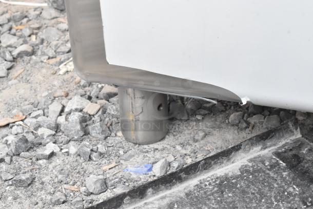 BRAND NEW SCRATCH AND DENT! Regency 600S42424224 Stainless Steel 4 Bay Sink with Dual Drain Boards, visible dent, no legs.