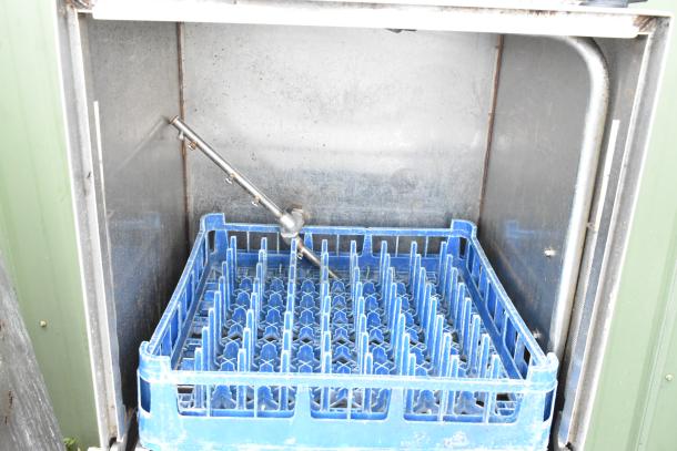 Auto-Chlor AC commercial front load dishwasher, stainless steel, 115 volts, 1 phase, blue dish rack inside.