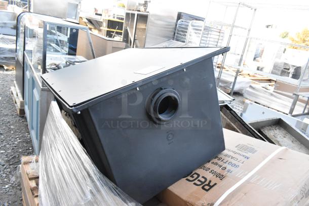 Brand new Regency and Ashland kitchen items, including a swinging door, work table, and grease trap, shown in industrial setting.