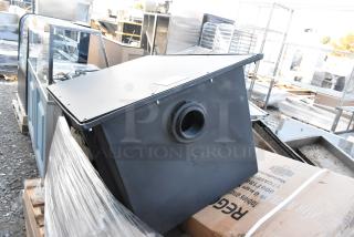 Brand new Regency and Ashland kitchen items, including a swinging door, work table, and grease trap, shown in industrial setting.