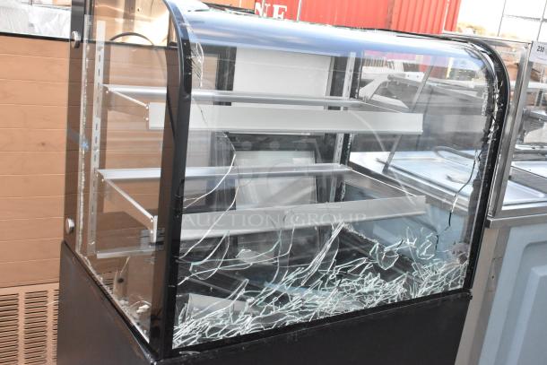 Brand new Avantco 193BC36HCB 36" curved glass black refrigerated bakery display case, broken glass, 110-120V, 1 phase.