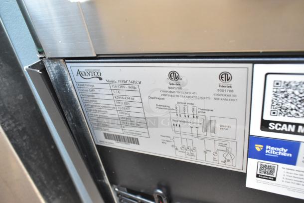 Alt text: Avantco 193BC36HCB bakery display case, curved glass, black, model label visible. Note: broken glass, 110-120V.