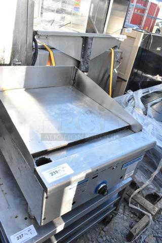 Rankin-Delux 24-C stainless steel gas griddle, commercial countertop, natural gas powered, visible wear, auction tag present.
