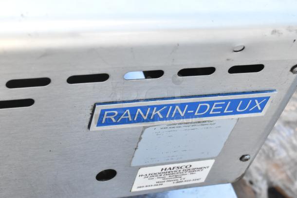 Rankin-Delux 24-C stainless steel flat top griddle, natural gas, commercial use, visible branding and service label.