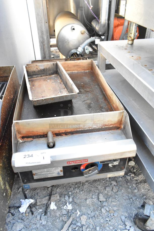 Star 613 Stainless Steel Countertop Gas Flat Top Griddle, used condition, with temperature dial and "Caution Hot" label.