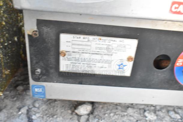 Star 613 stainless steel gas griddle, label shows model and NSF certification, countertop design, good condition.