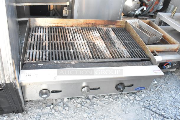 Cook Rite stainless steel commercial countertop gas charbroiler grill, used condition, visible wear, control knobs intact.