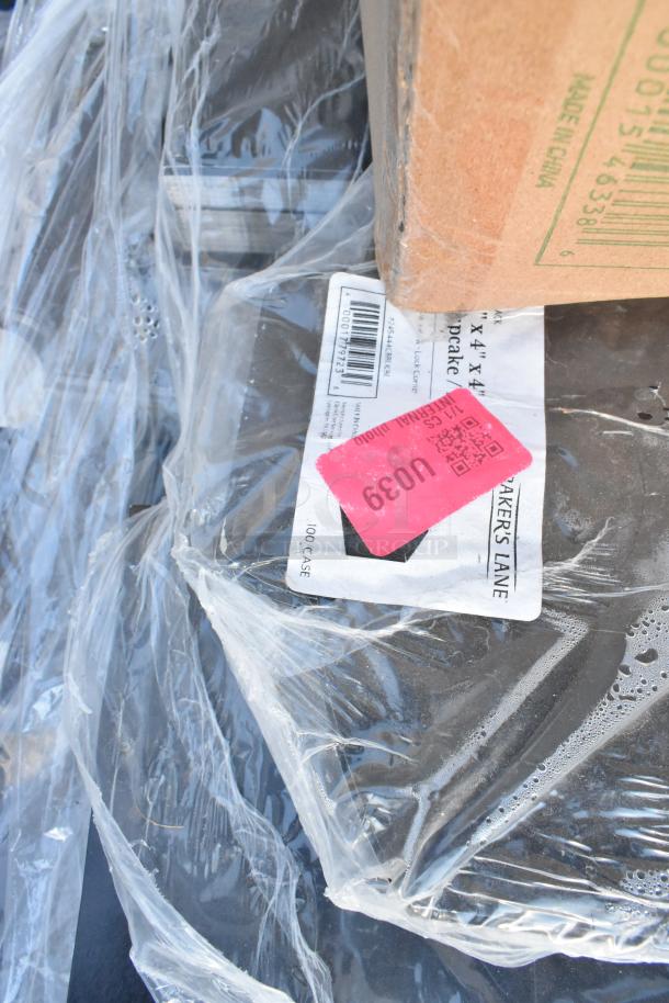 Plastic-wrapped package with barcode and pink label U039, indicated as "4x4"x4", 100 count case by Maker's Lane.