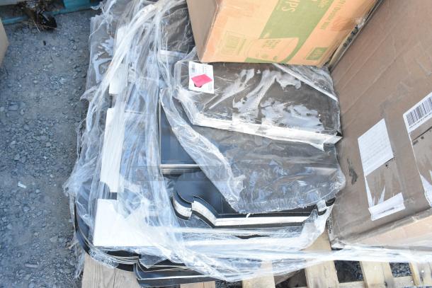 Five brand new scratch and dent items, including hot cups and barstool, wrapped in plastic on pallets. Visible markings showing "hot cups."