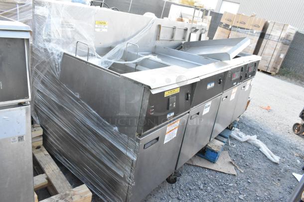 Giles EOF-24 stainless steel 3-bay deep fat fryer with dumping station on casters. 480V, 3 phase. Visible safety labels.