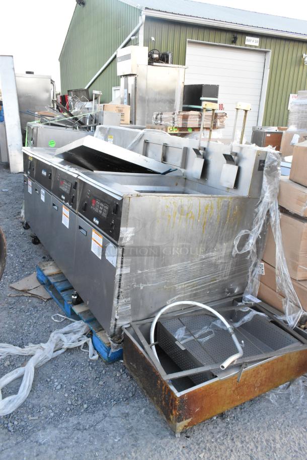 Giles EOF-24 Stainless Steel 3 Bay Electric Fryer with Dumping Station, on casters, 480V 3 Phase. Visible wear, outdoors.
