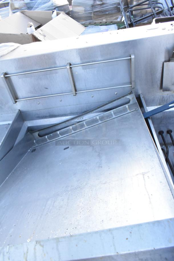 Giles EOF-24 stainless steel 3-bay deep fat fryer with dumping station on casters. Electric, 480V, 3 phase. Visible wear.