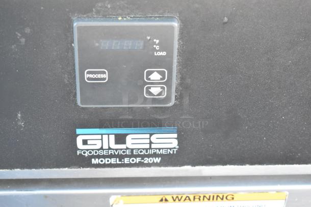 Stainless steel Giles EOF-24 commercial fryer, 3 bay with dumping station, on casters. Control panel and model label visible.