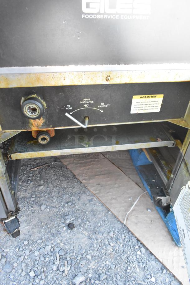 Giles EOF-24 stainless steel commercial electric fryer, 3 bays, dumping station, 480V, 3-phase, on casters, visible wear.
