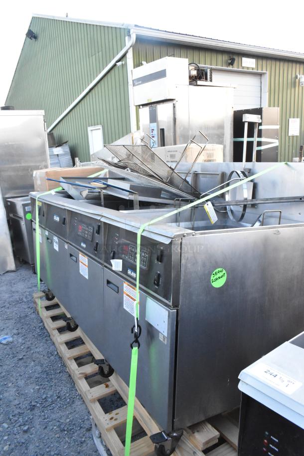 Giles EOF-24 stainless steel 3-bay deep fat fryer with dumping station, on commercial casters, 480V, 3-phase.