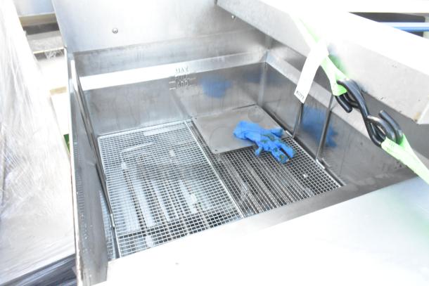 Giles EOF-24 stainless steel electric 3-bay deep fryer with dumping station, commercial casters, 480V, 3 phase. Visible markings indicate max fill line.