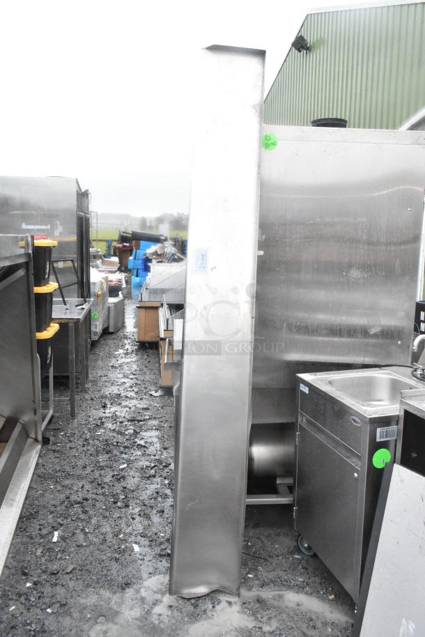 Stainless steel wall mount shelf, industrial-grade, in used condition, visible wear, ideal for commercial kitchens.