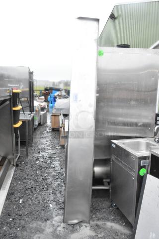 Stainless steel wall mount shelf, industrial-grade, in used condition, visible wear, ideal for commercial kitchens.