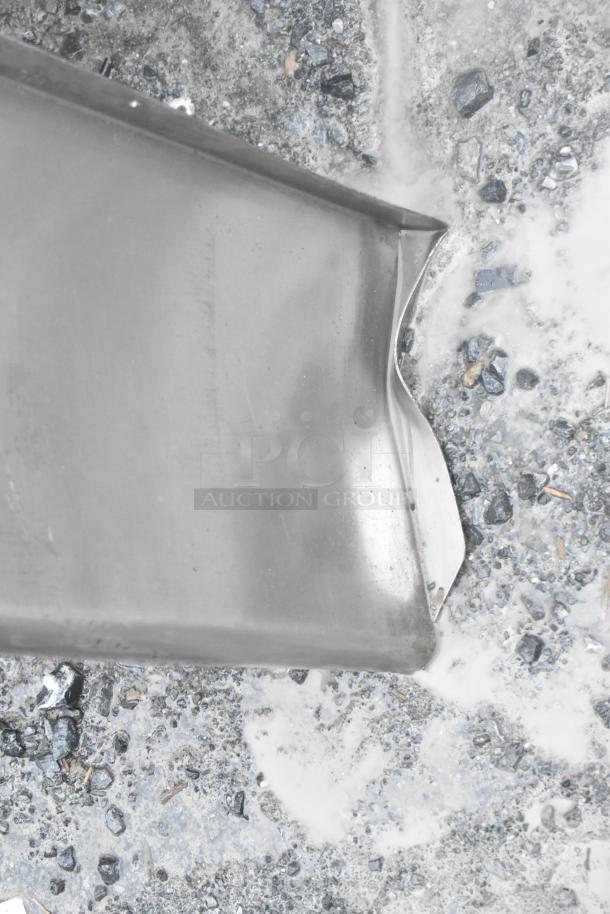 Stainless Steel Wall Mount Shelf, slightly dented, durable material, suitable for kitchens or garages.