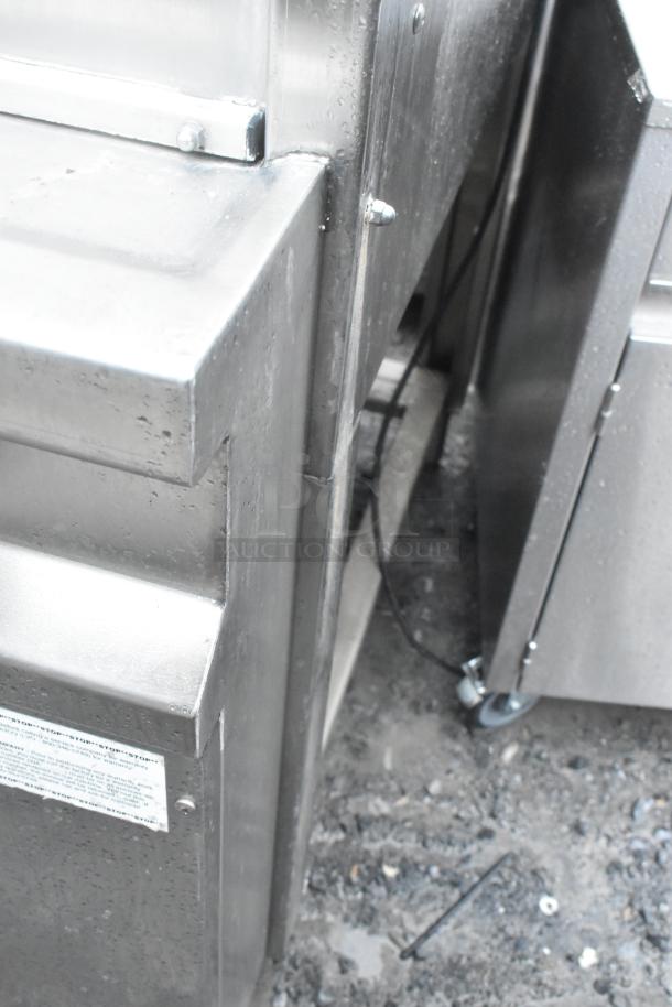 LVO Stainless Steel Commercial Front Load Pot and Pan Washer, durable construction, visible label, good condition.