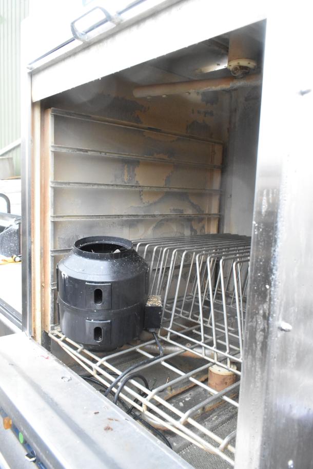 LVO Stainless Steel Commercial Front Load Pot and Pan Washer, visible interior racks, used condition, some wear.