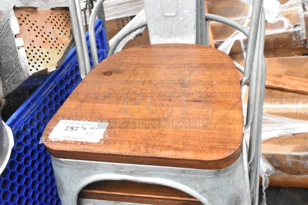 5 gray metal dining height chairs with wooden seats, good condition. Visible tag indicates quantity and auction details.