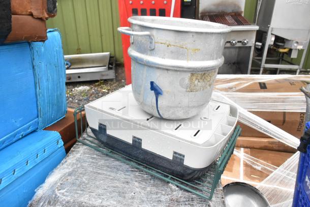 Lot of kitchen items including a metal dough bin and poly white storage container. Used condition with visible wear.