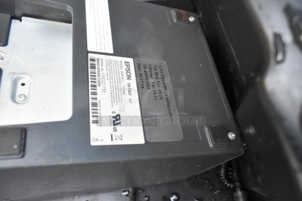 Epson TM-T20II receipt printer, model M267E, good condition, visible barcodes and serial numbers, black casing.