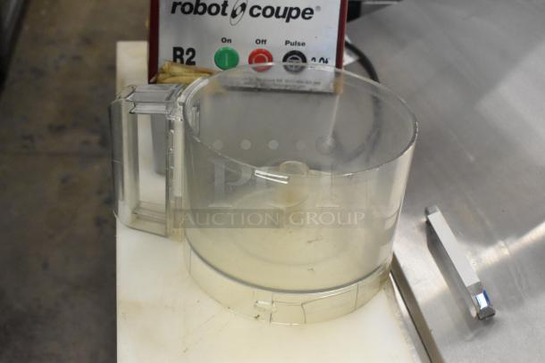 Robot Coupe R2NCLR countertop food processor with clear bowl and S blade. Model R2, 120 volts, 1 phase. Good condition.