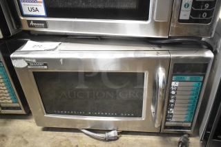 2023 Sharp R-21LVF stainless steel commercial microwave oven, 120V, 1 Phase, visible wear on control panel, model R-21LVF.